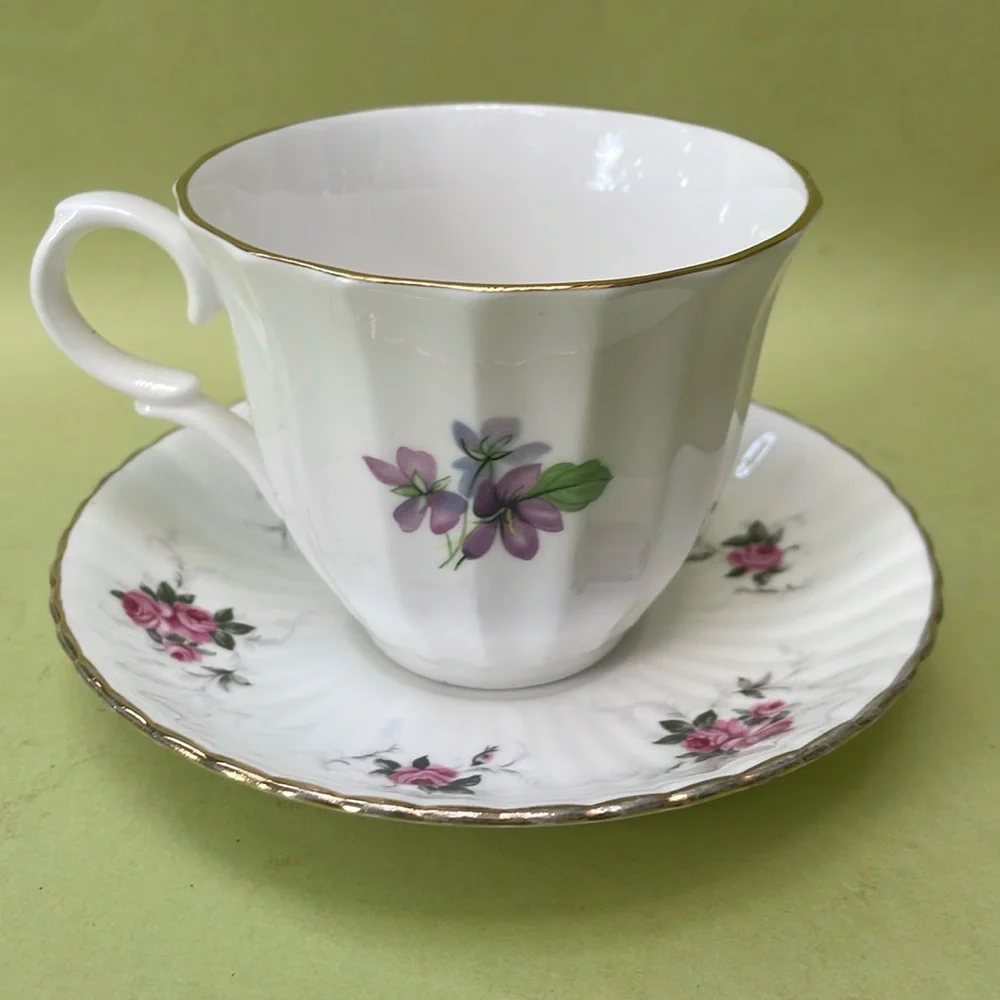 Antique bone china tea cup with saucer